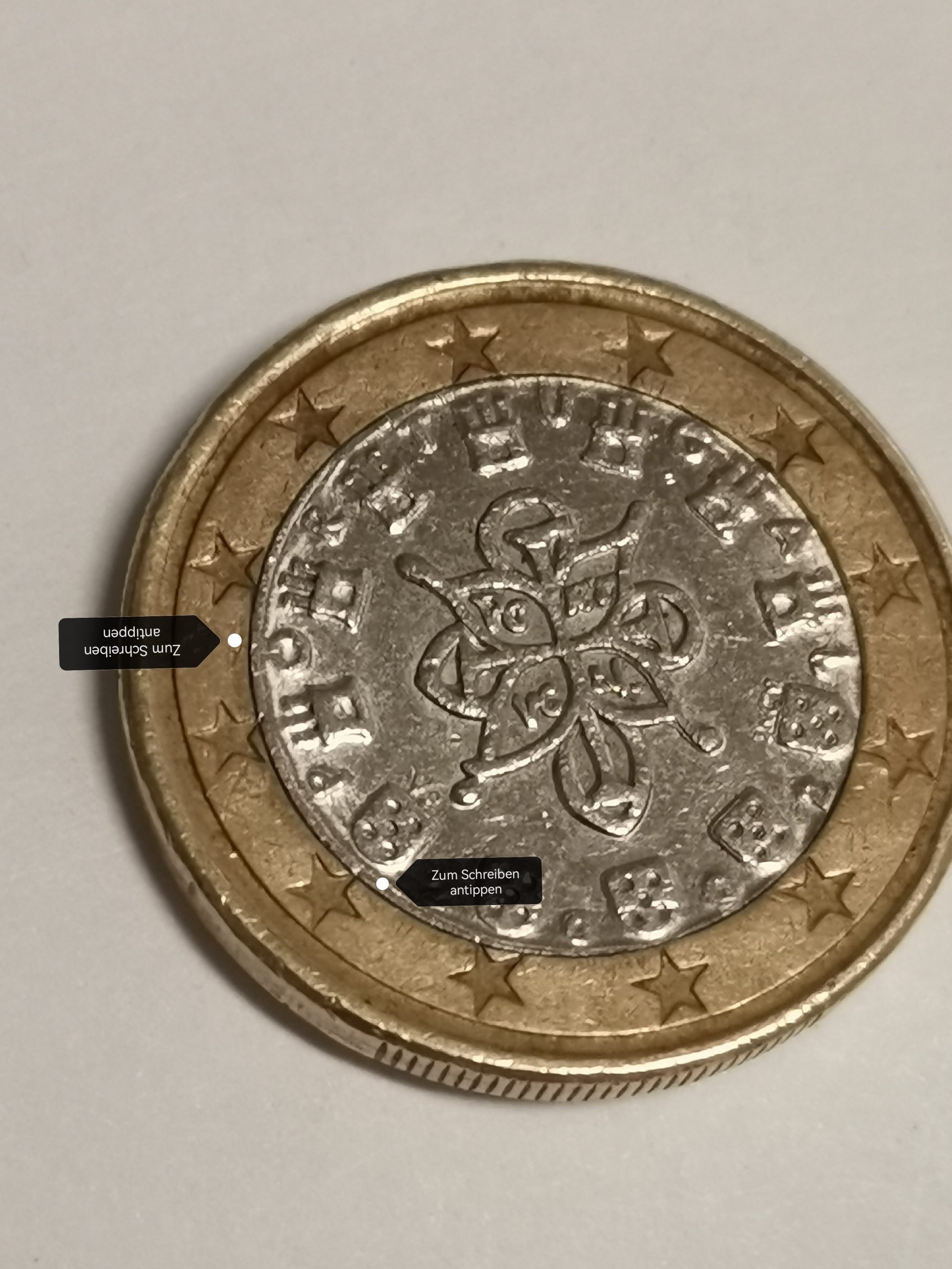 1 Euro Münze aus Portugal 2002 an mit mehreren fehlprägungen.